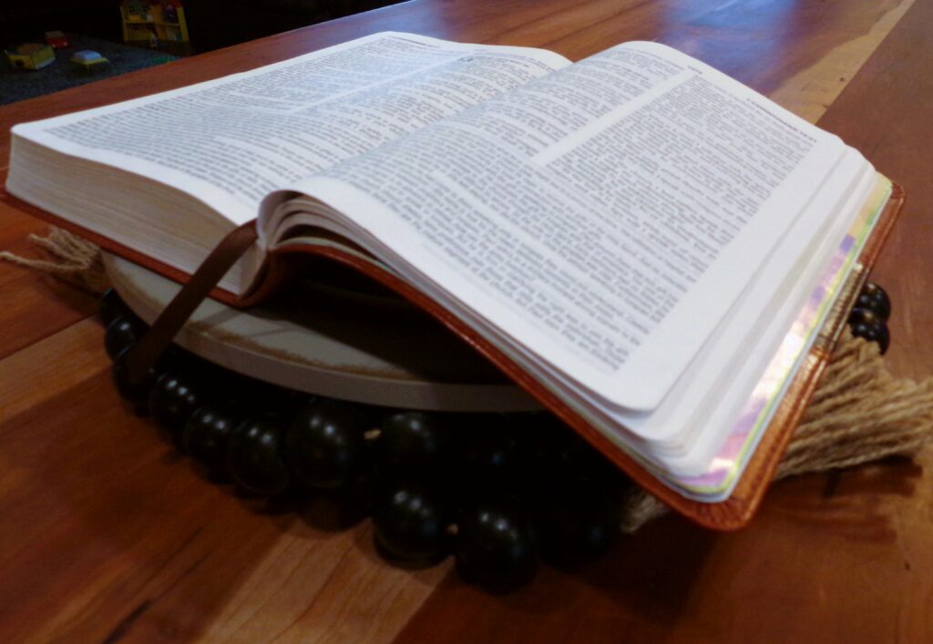 An opened Bible on a counter