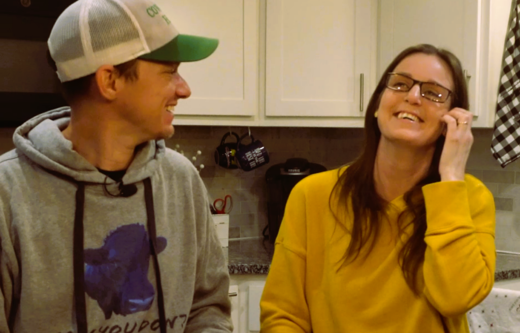 Man looking at woman smiling