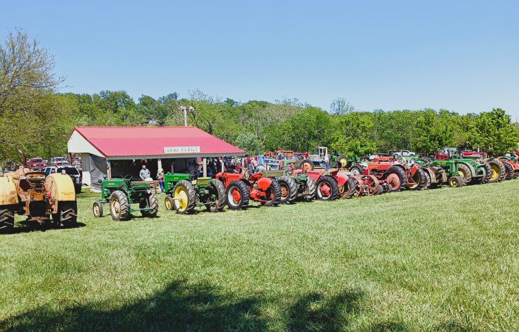 Tractors lined up in a field