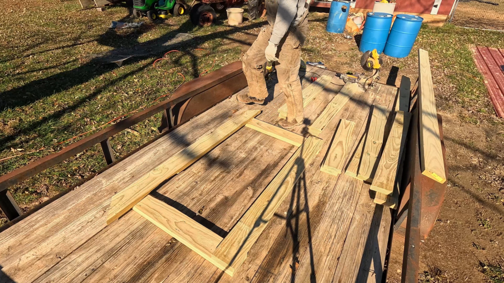 Boards on a trailer being screwed together