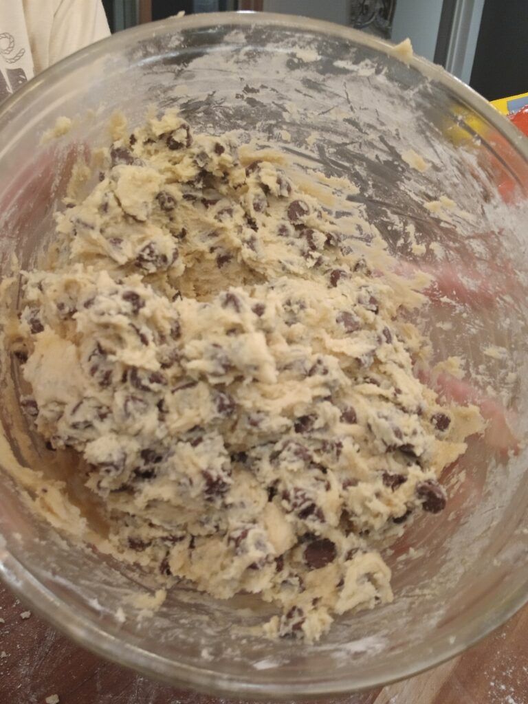 Chocolate chip cookie dough in a bowl