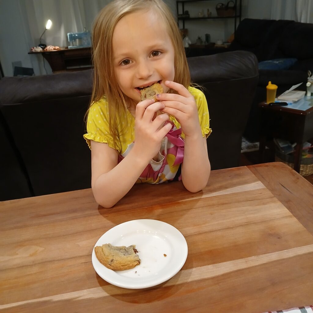 Girl eating cookie