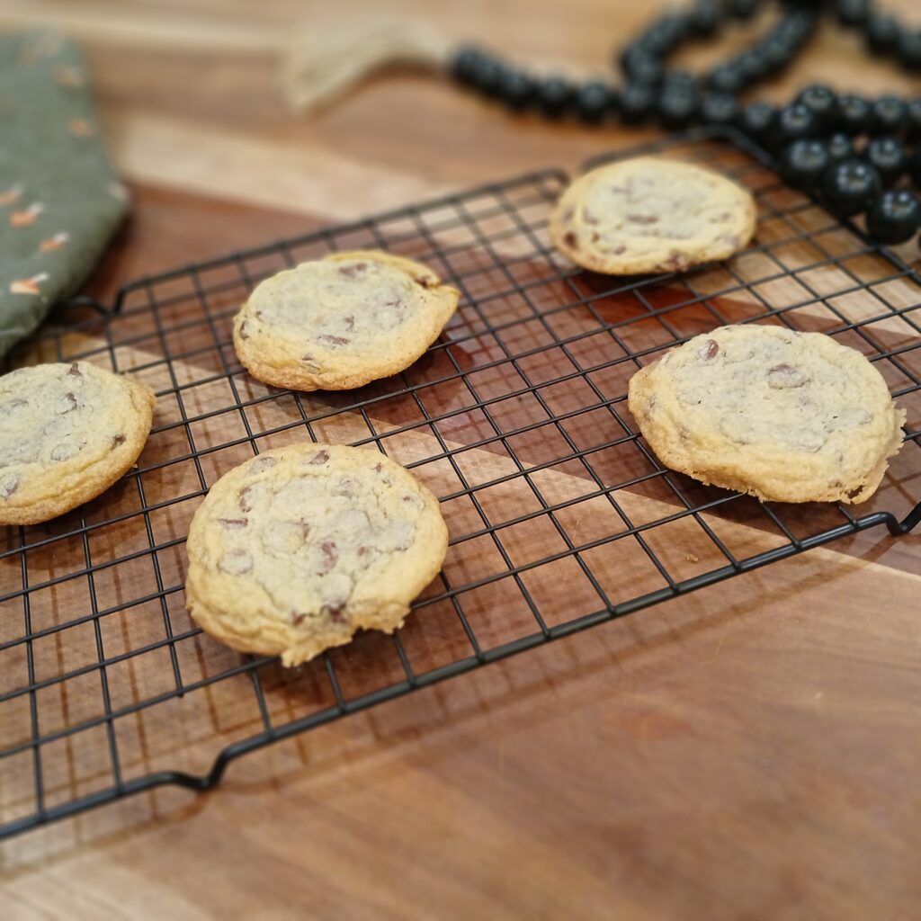 Chocolate chip cookies on drying rack