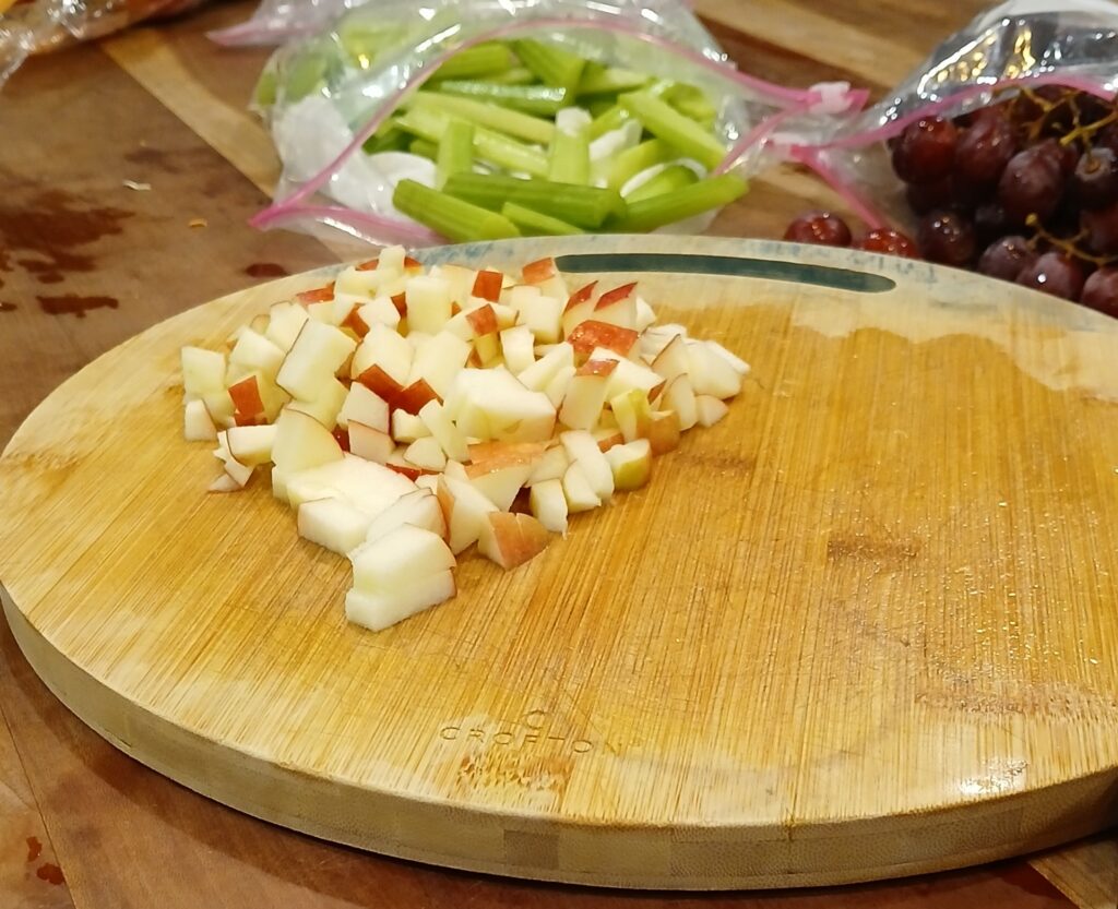Diced apples on a cutting board