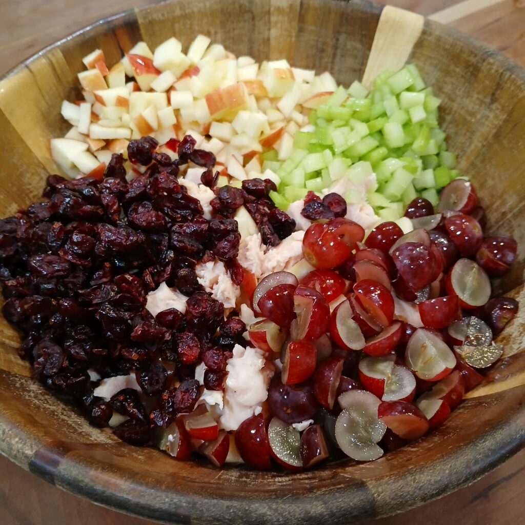 Ingredients for chicken salad in a bowl
