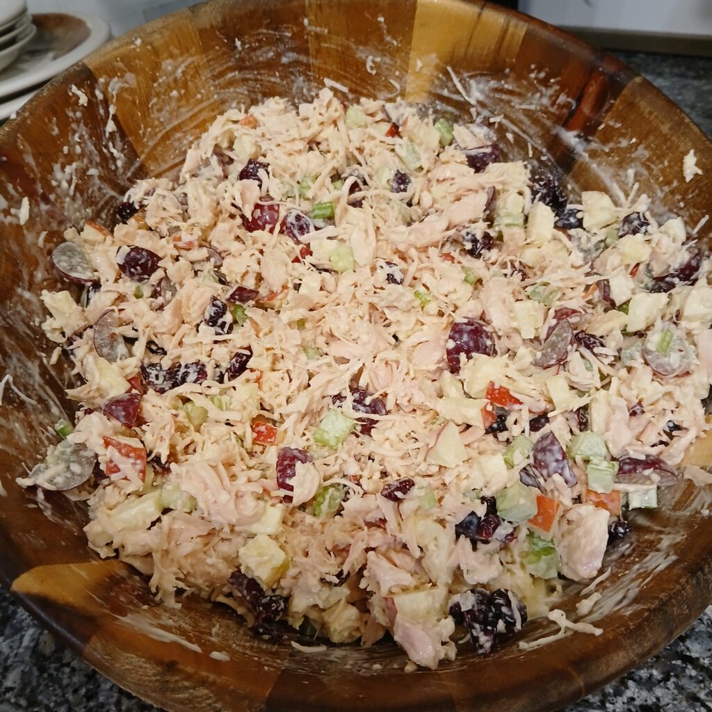 Chicken salad in a wooden bowl